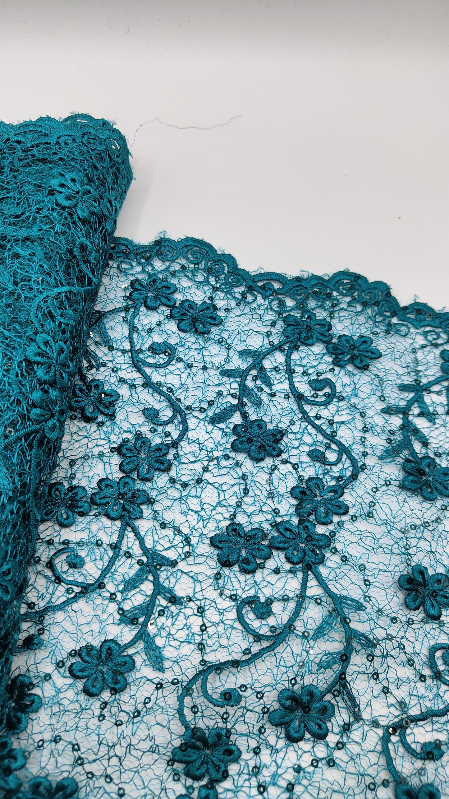 Pizzo con paillettes