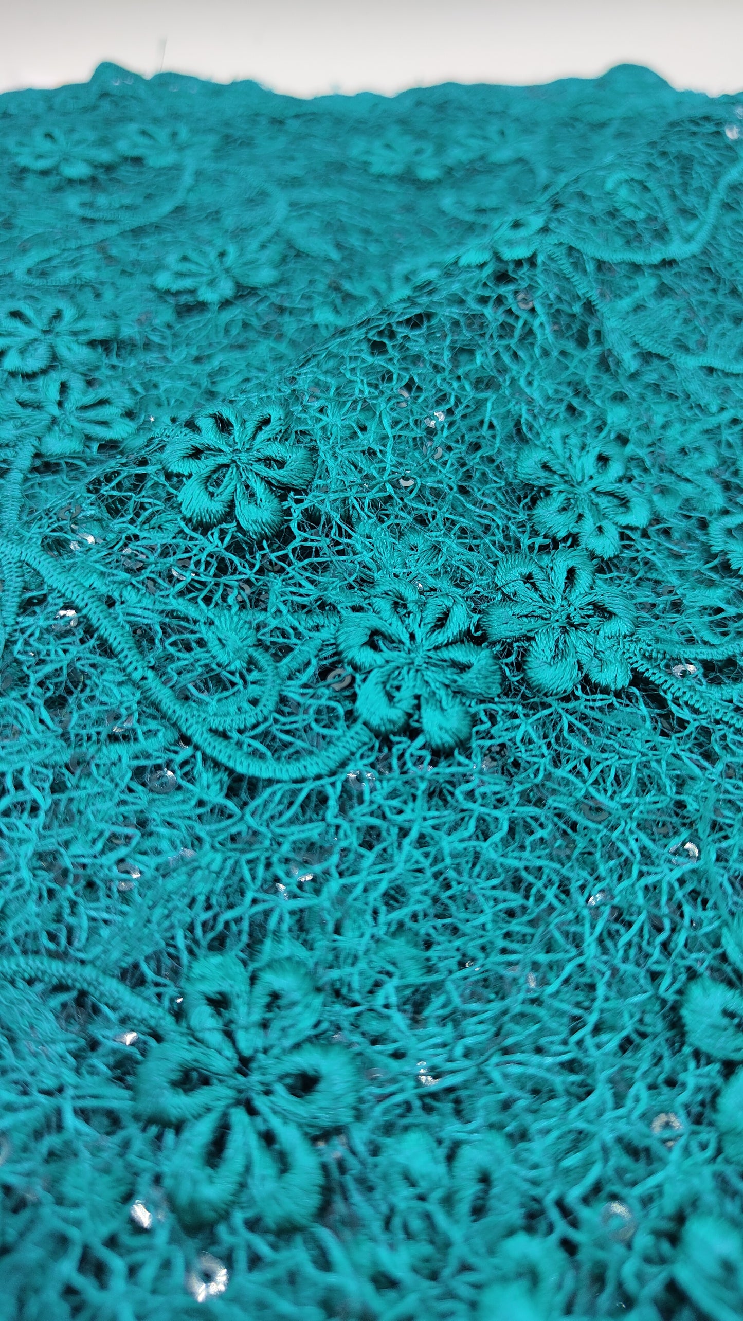Pizzo con paillettes